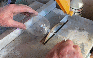 Using a diamond blade to cut a glass stem