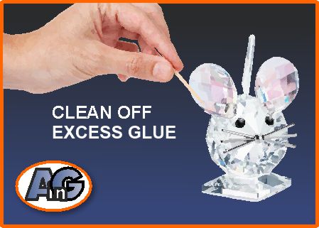 Clean off excess glue from Swarovski mouse figurine