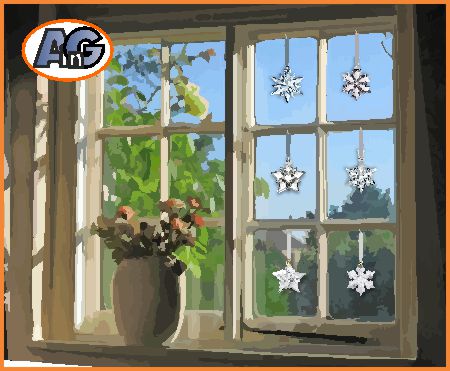 Swarovski annual ornaments in windows